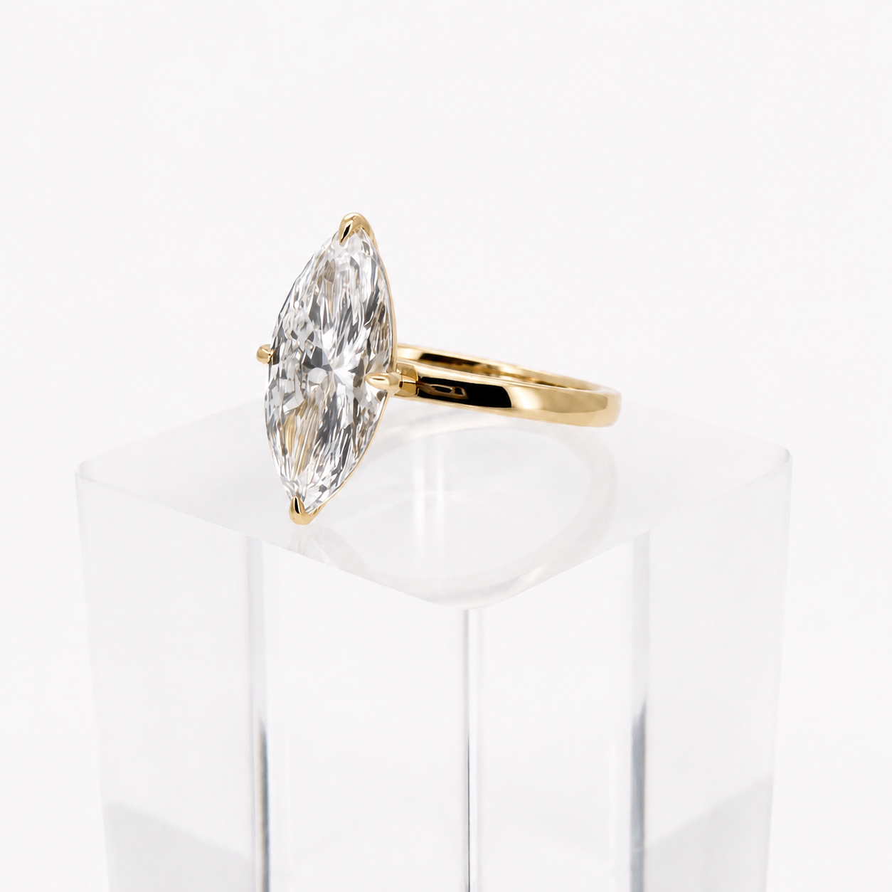 3.00ct E VS1 marquise lab grown diamond ring in 14K yellow gold, three-quarter view