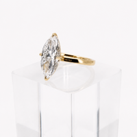 3.00ct E VS1 marquise lab grown diamond ring in 14K yellow gold, three-quarter view