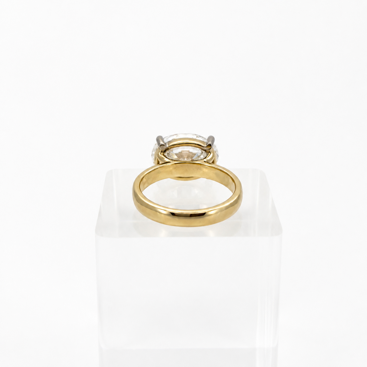 Custom 4.01ct oval diamond ring, rear view showing 3mm yellow gold band